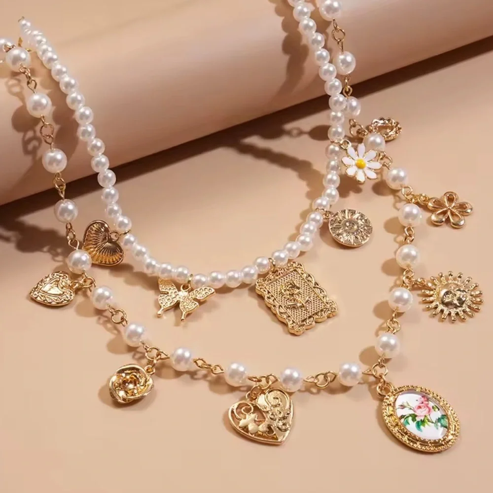 Women 2x Gold and Pearl Charm Necklace